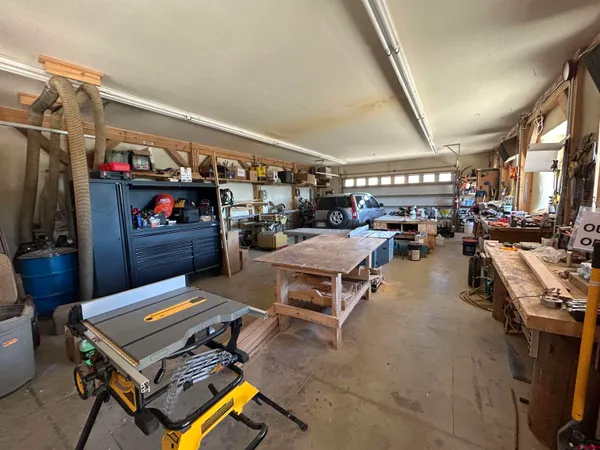 a outdoor space with lots of furniture and clutter