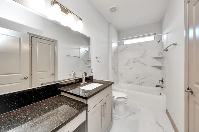 a view of a building with a patio