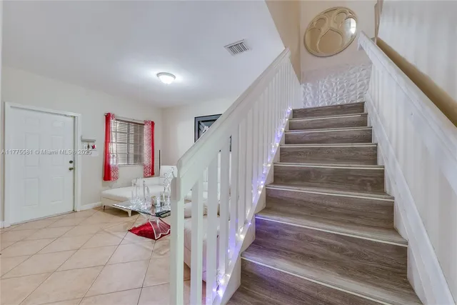 a view of entryway with a front door