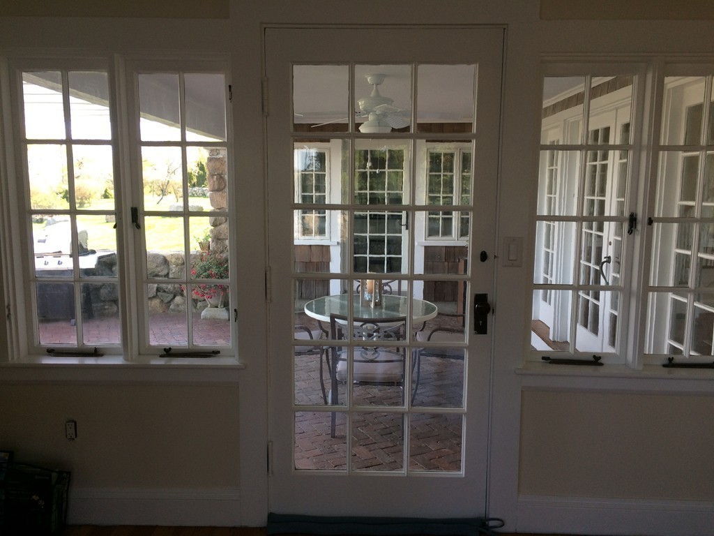 17 Way Road Gloucester, MA 01930 - Photo 8 of 28 a view of a dining room with furniture and front door