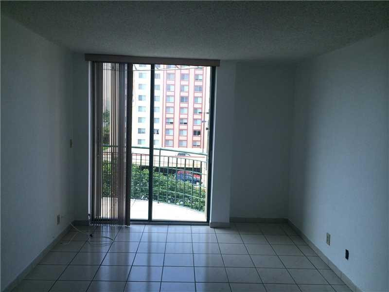 546 Southwest 1st Street, Unit 612 Miami, FL 33130 - Photo 4 of 4 a view of an empty room and window