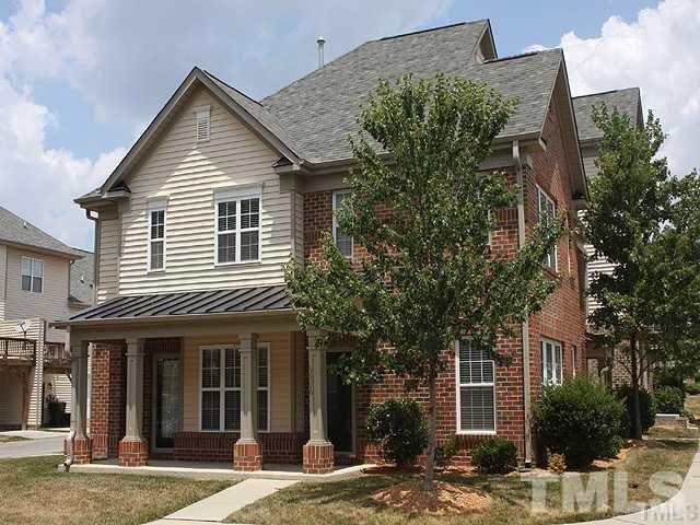9826 Grettle Court Raleigh, NC 27617 - Photo 1 of 9 a view of a house with a yard and potted plants