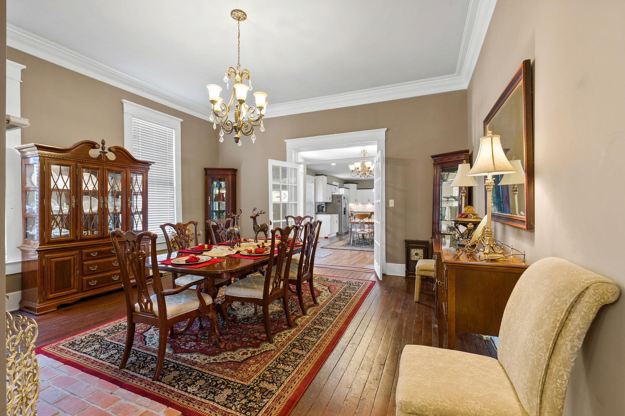 554 East Main Street Jackson, TN 38301 - Photo 12 of 38 a view of a dining room with furniture window and wooden floor