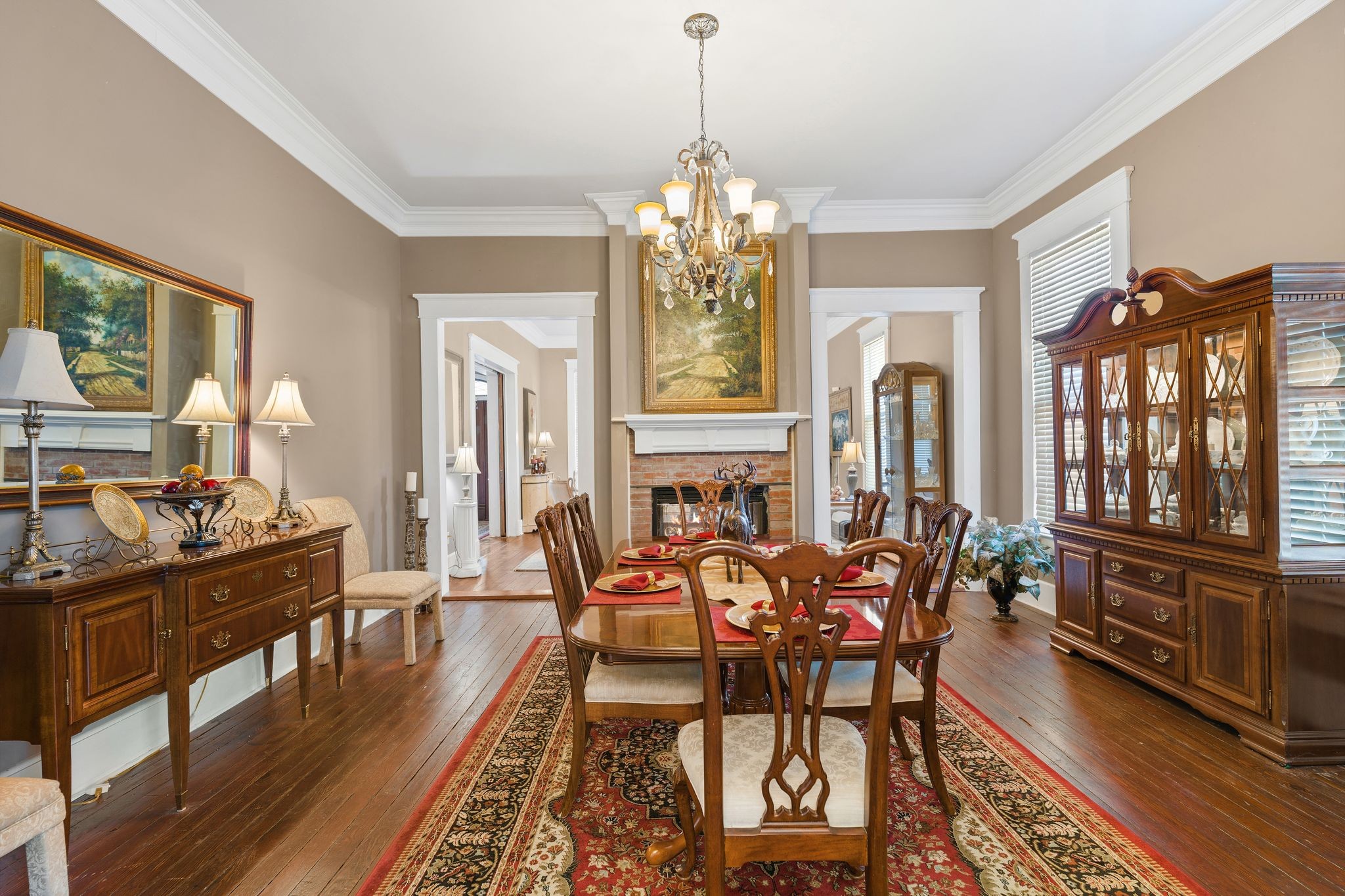 554 East Main Street Jackson, TN 38301 - Photo 13 of 38 a view of a dining room with furniture window and wooden floor