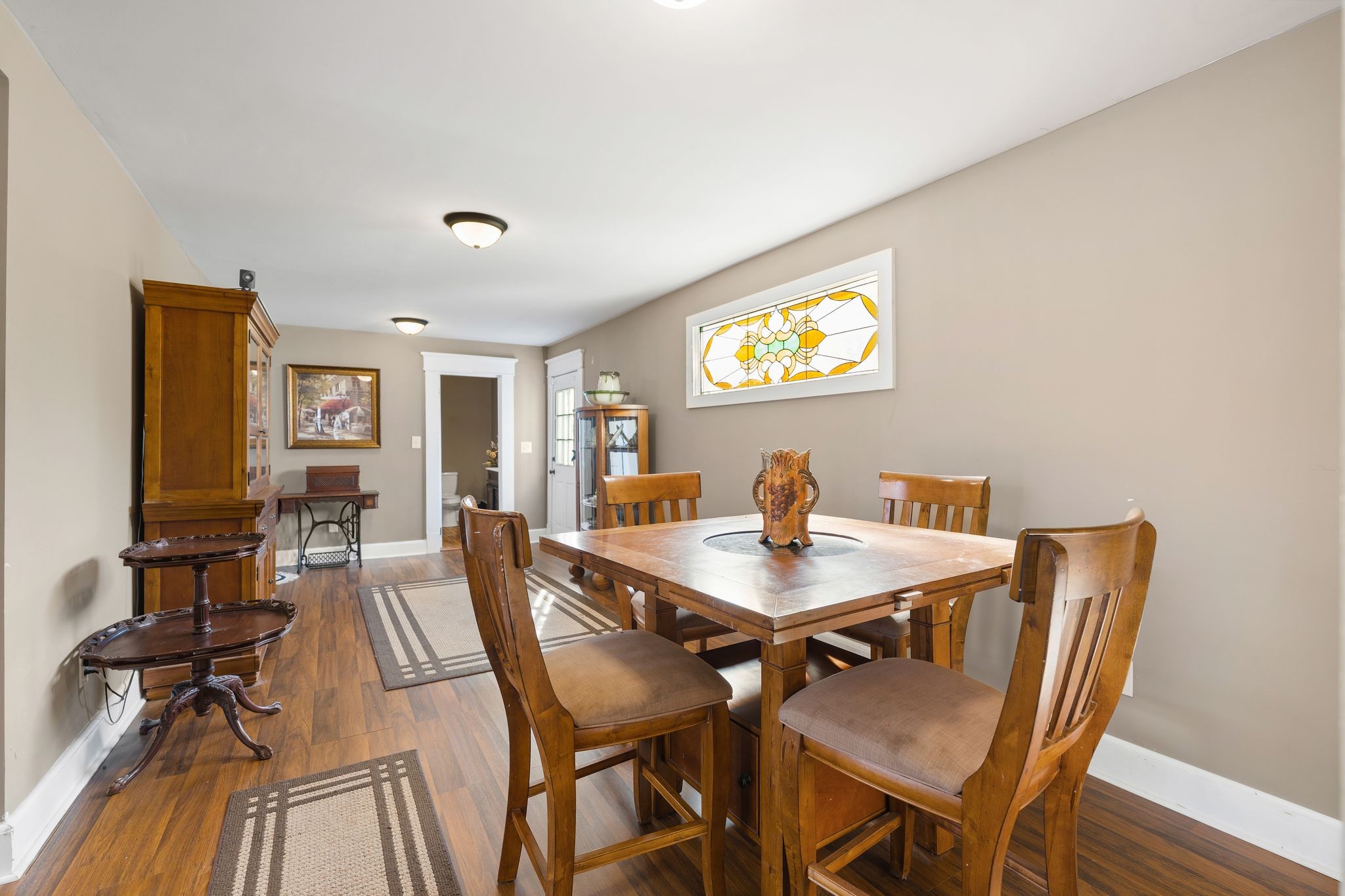 554 East Main Street Jackson, TN 38301 - Photo 17 of 38 a view of a dining room with furniture and wooden floor