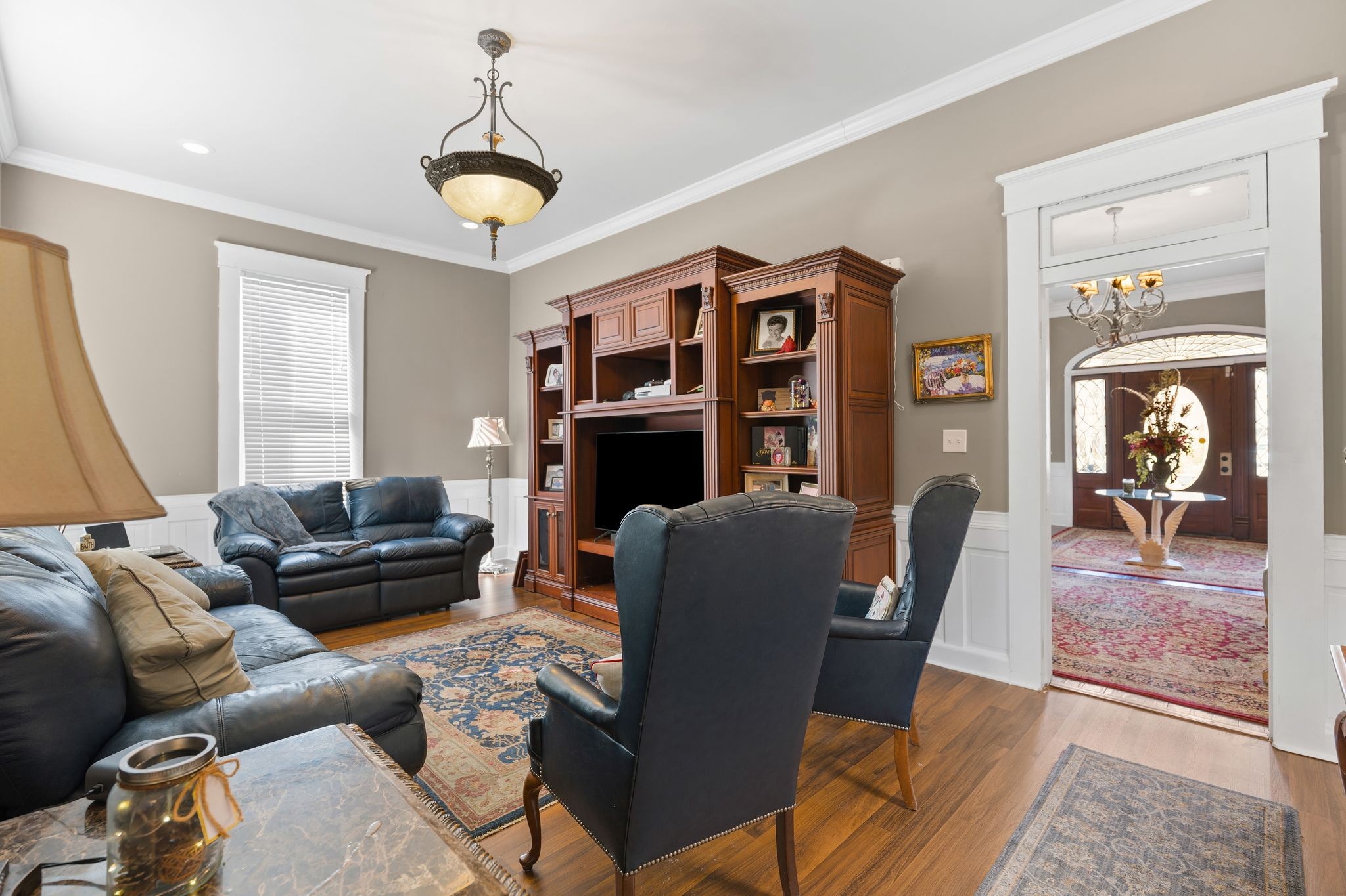 554 East Main Street Jackson, TN 38301 - Photo 20 of 38 a living room with furniture fireplace and a window