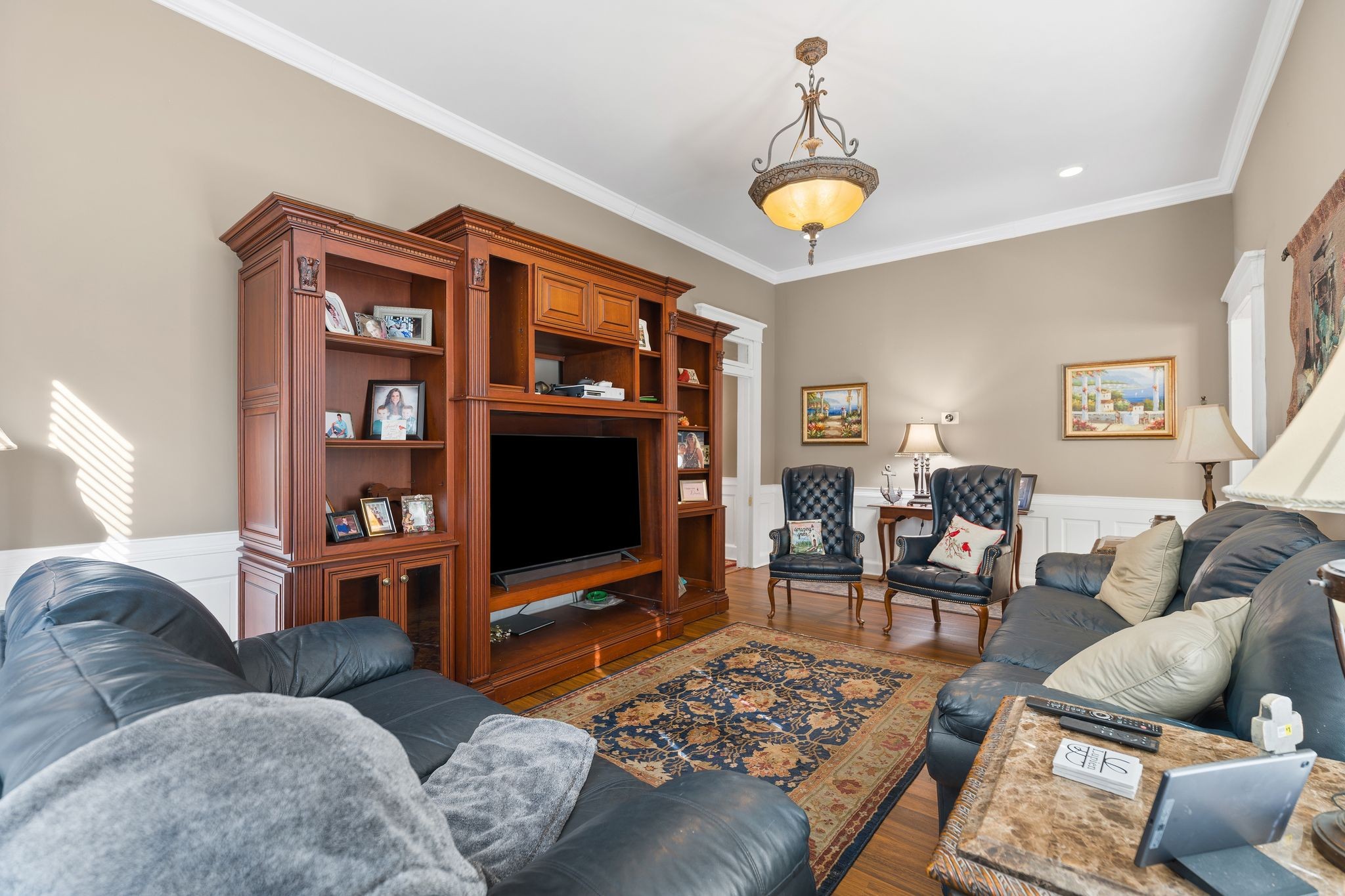 554 East Main Street Jackson, TN 38301 - Photo 21 of 38 a living room with furniture and a flat screen tv