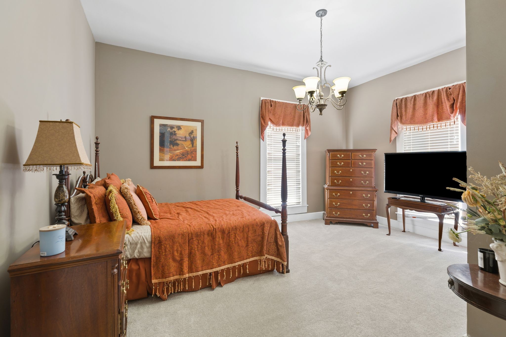 554 East Main Street Jackson, TN 38301 - Photo 24 of 38 a bedroom with bed tv and chair