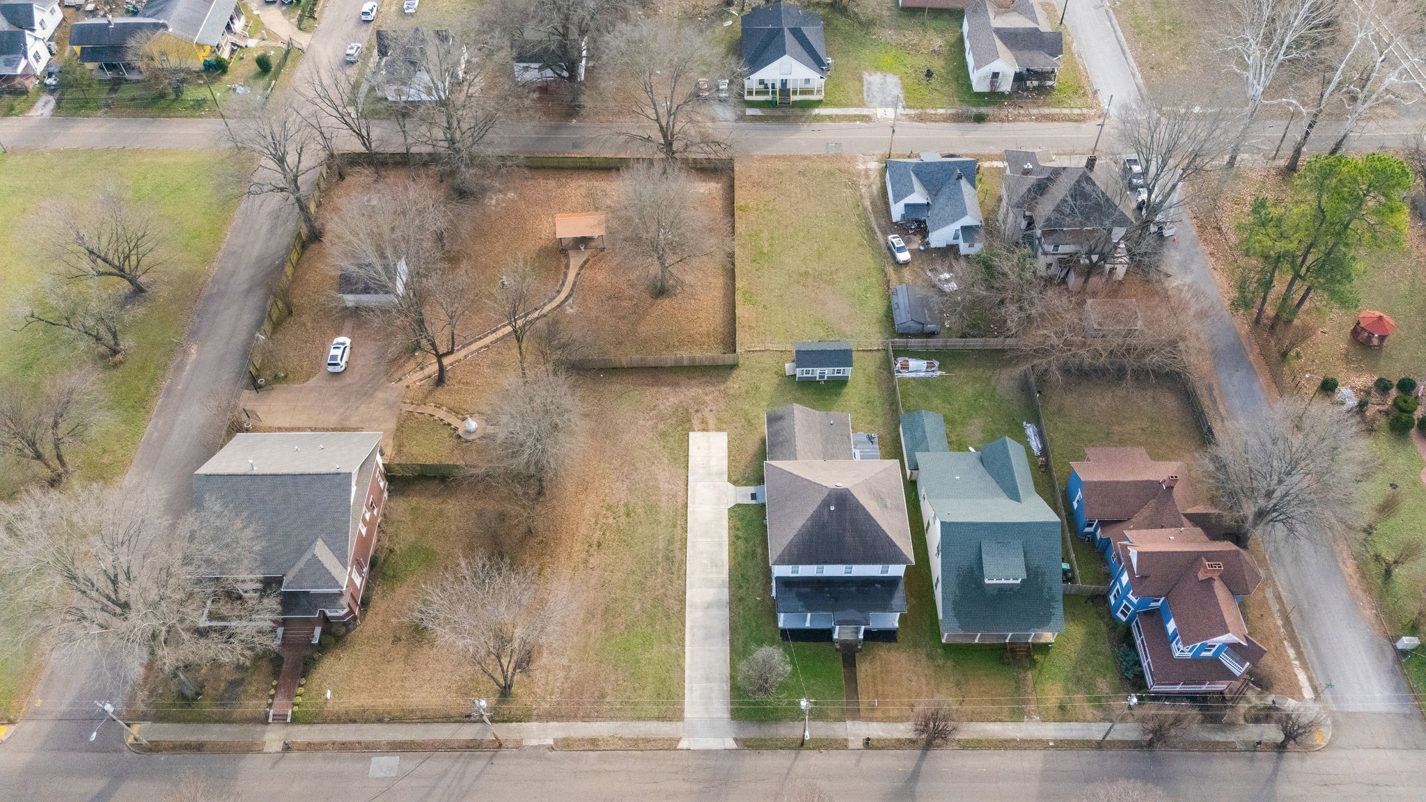 554 East Main Street Jackson, TN 38301 - Photo 36 of 38 a view of a house with a yard