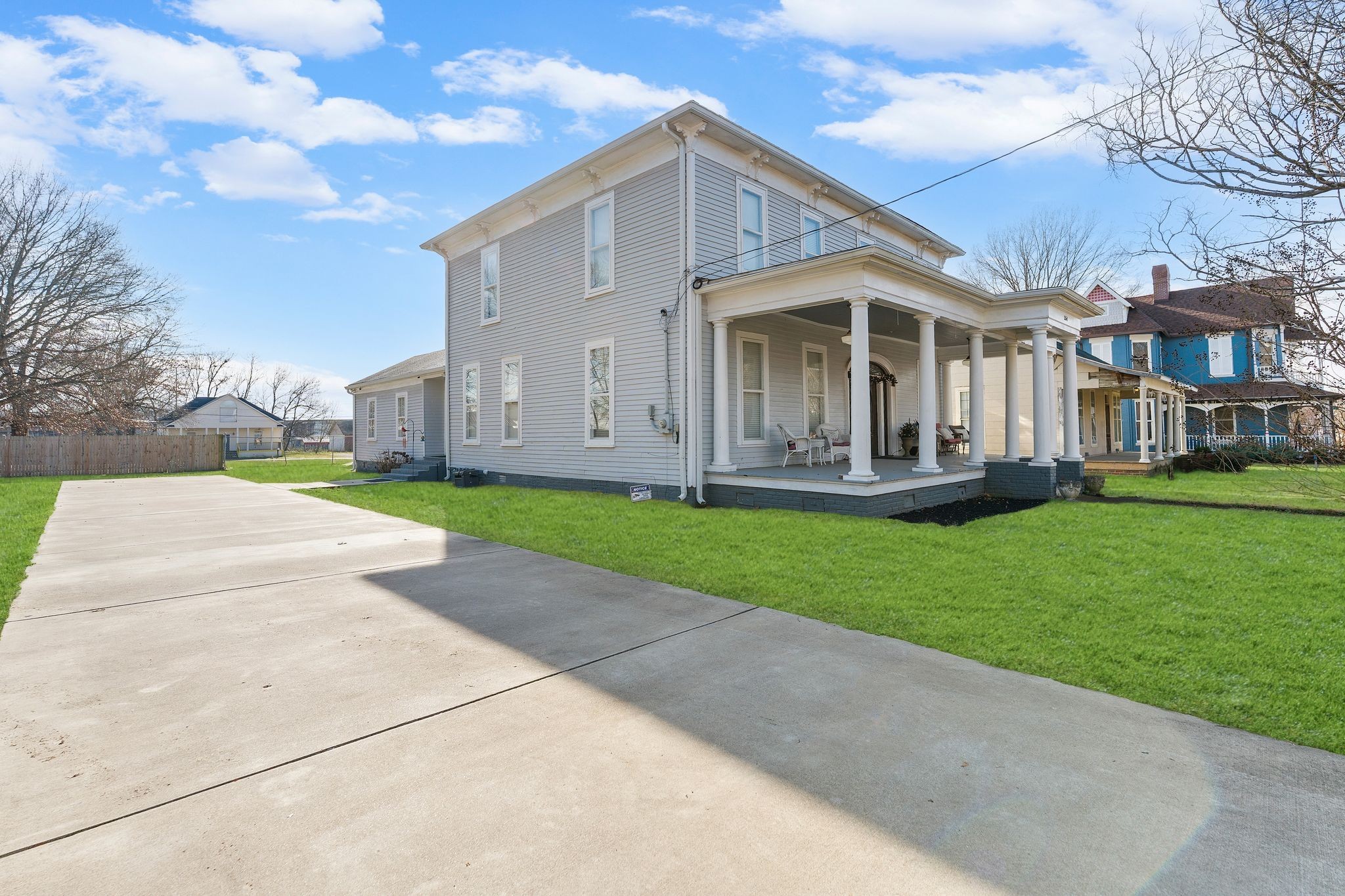 554 East Main Street Jackson, TN 38301 - Photo 6 of 38 a front view of a house with a yard and trees