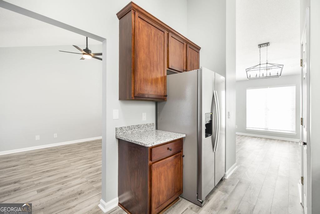 105 Browning Point Byron, GA 31008 - Photo 15 of 39 a utility room with cabinets washer and dryer