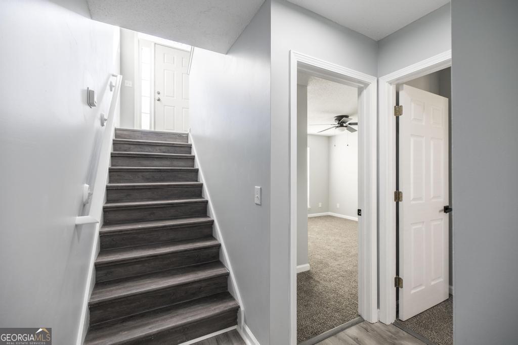 105 Browning Point Byron, GA 31008 - Photo 27 of 39 a view of a hallway with wooden floor and entryway