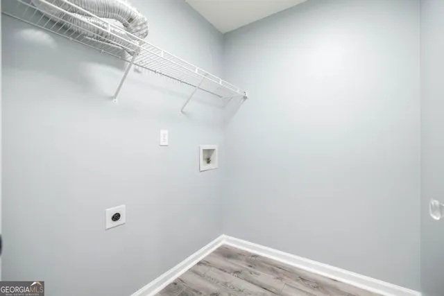 a view of a room with racks on the wall