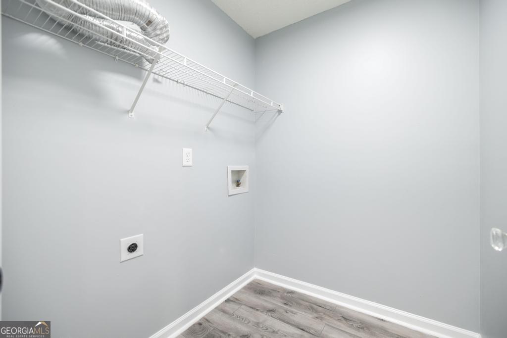 105 Browning Point Byron, GA 31008 - Photo 33 of 39 a view of a room with racks on the wall