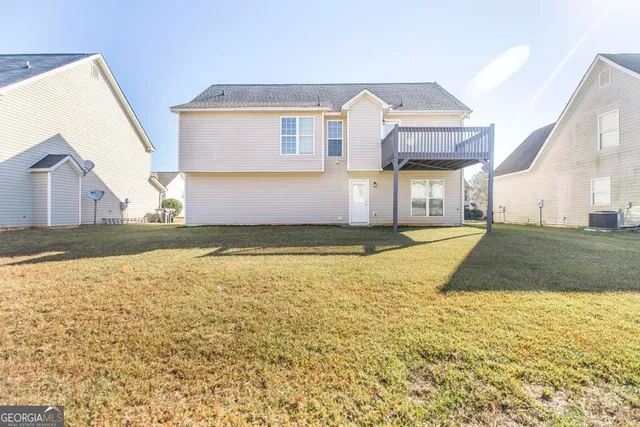 a view of a house with a swimming pool