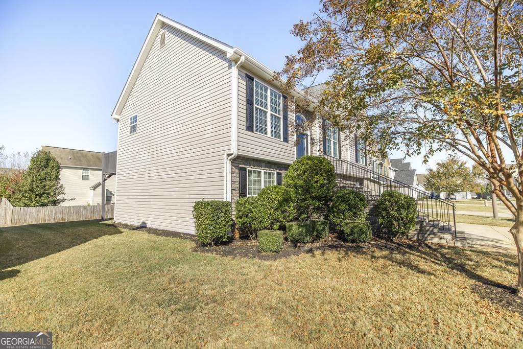 105 Browning Point Byron, GA 31008 - Photo 4 of 39 a view of a house with a yard
