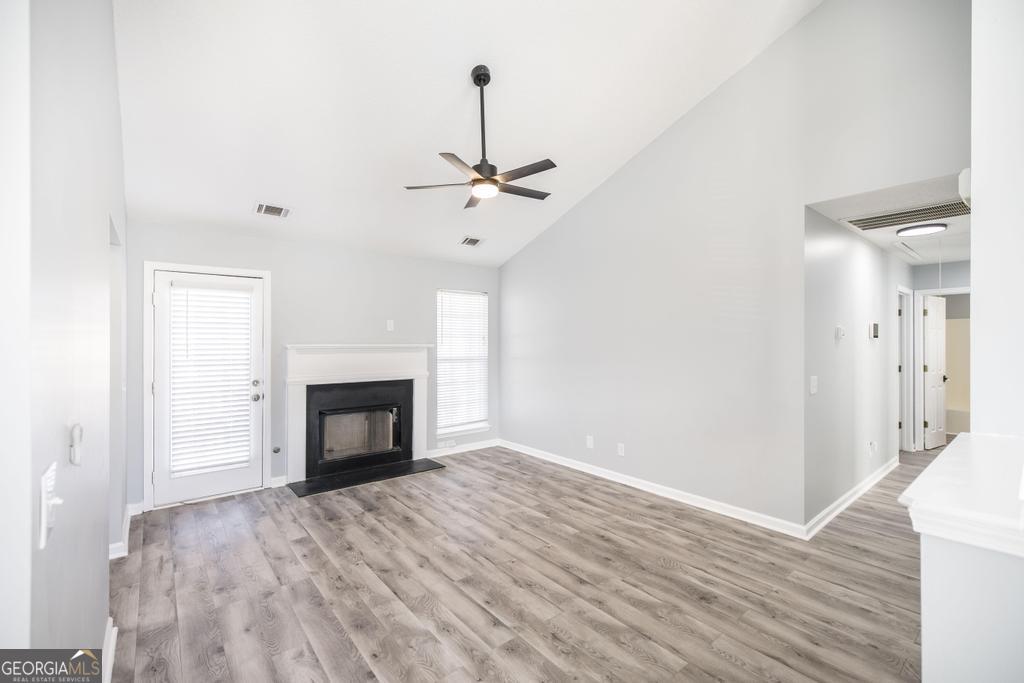 105 Browning Point Byron, GA 31008 - Photo 9 of 39 a view of an empty room with a fireplace