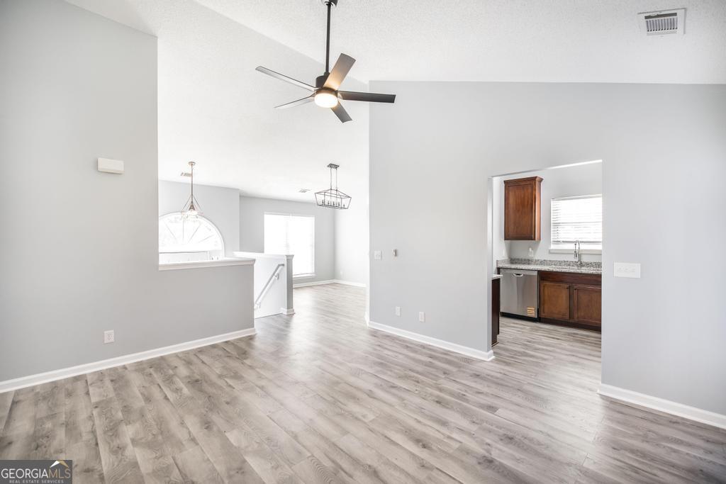105 Browning Point Byron, GA 31008 - Photo 10 of 39 a view of a kitchen with a sink and a stove top oven