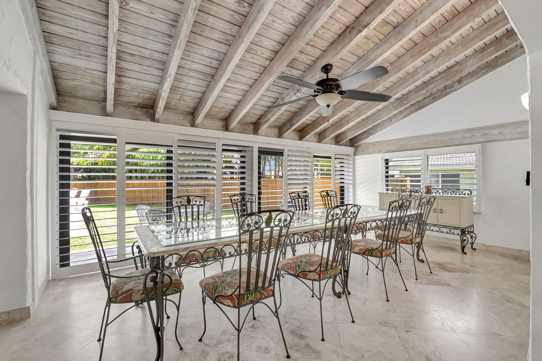 804 Foxpointe Circle Delray Beach, FL 33445 - Photo 13 of 43 a view of a dining room with furniture window and outside view