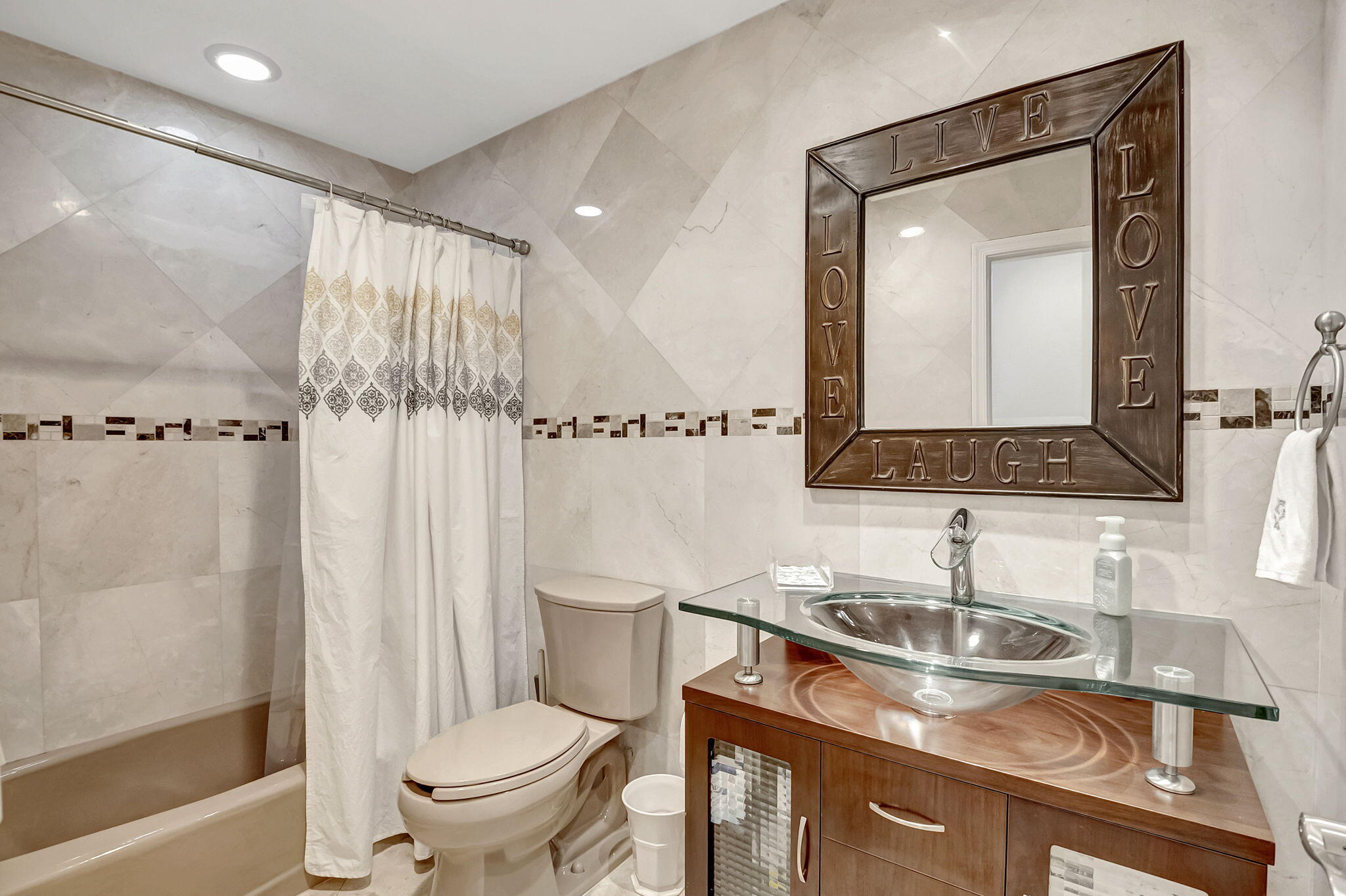 804 Foxpointe Circle Delray Beach, FL 33445 - Photo 26 of 43 a bathroom with a granite countertop sink toilet and shower