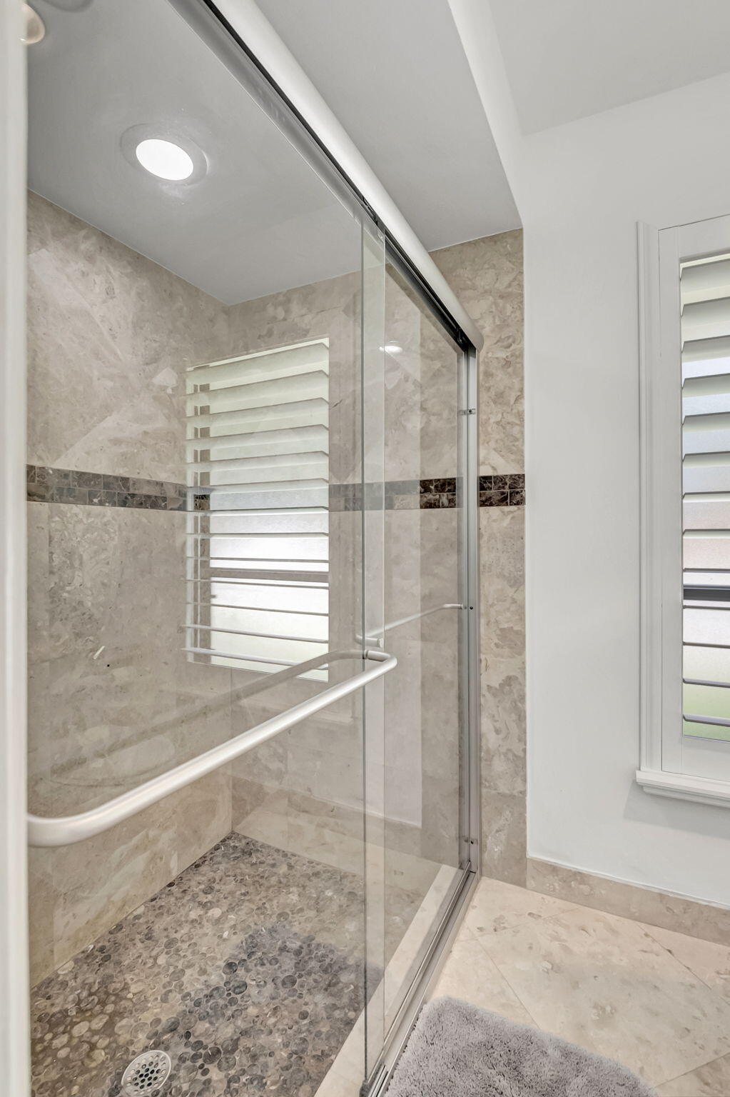 804 Foxpointe Circle Delray Beach, FL 33445 - Photo 32 of 43 a bathroom with a shower