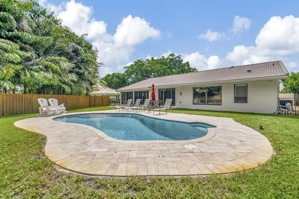 a view of outdoor space yard and swimming pool