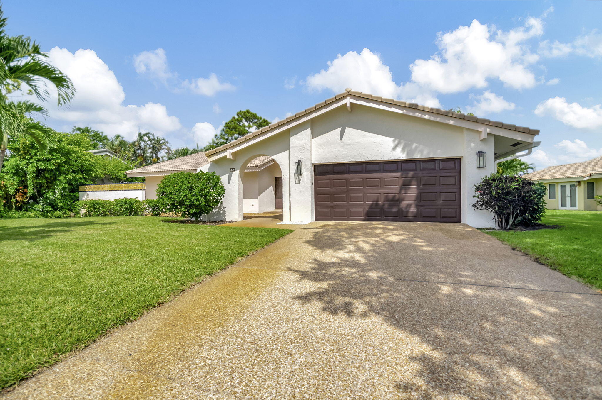 804 Foxpointe Circle Delray Beach, FL 33445 - Photo 4 of 43 a view of a house with a yard