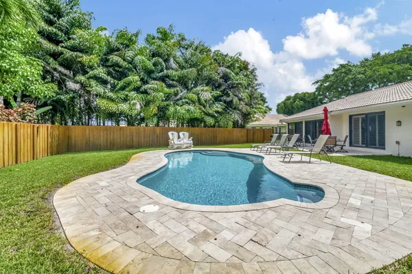 a view of outdoor space yard and swimming pool