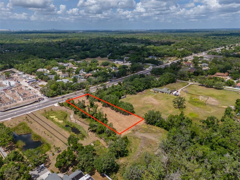 5106 Bell Shoals Road Valrico, FL 33596 - Photo 10 of 18 an aerial view of residential houses with outdoor space and garden
