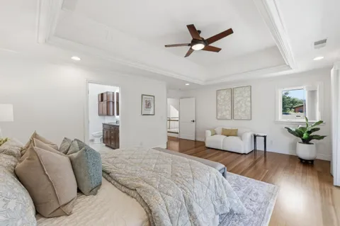 a bed room with a bed and a couch