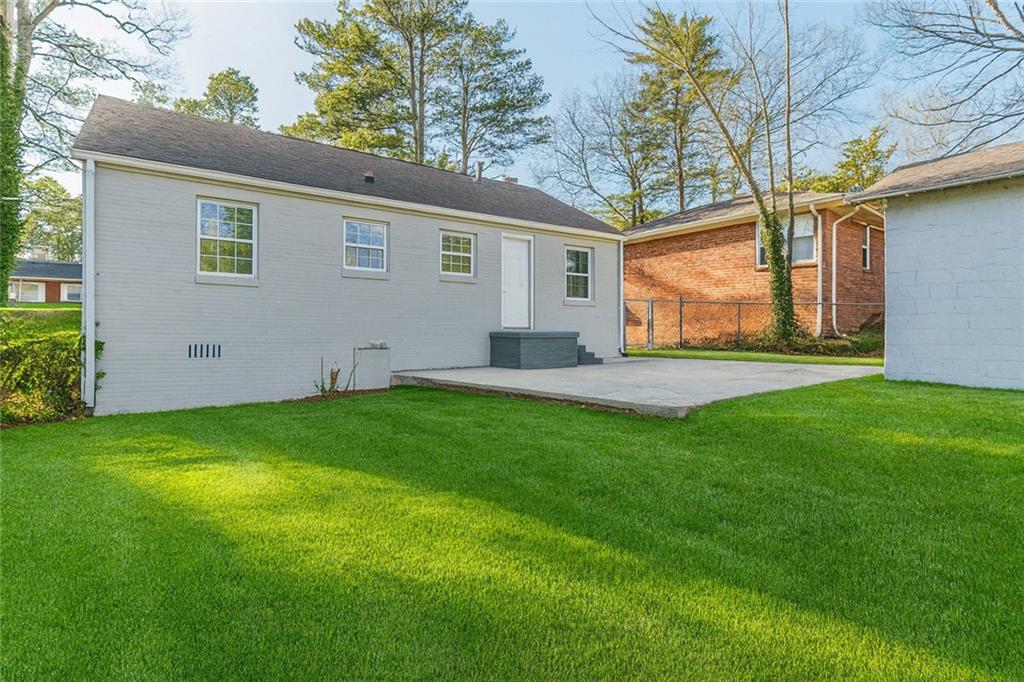 1376 Westmont Road Southwest Atlanta, GA 30311 - Photo 41 of 41 a view of an house with backyard space and garden