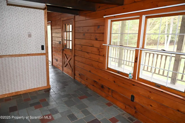 a kitchen with a sink and a refrigerator