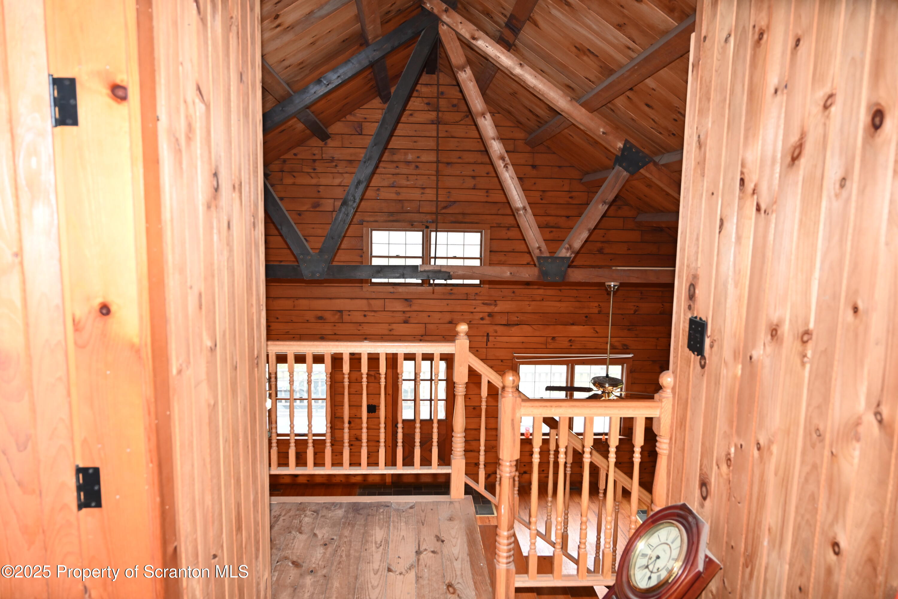 1271 Graham Holw Road Hallstead, PA 18822 - Photo 16 of 56 a view of a porch with wooden floor and a gate