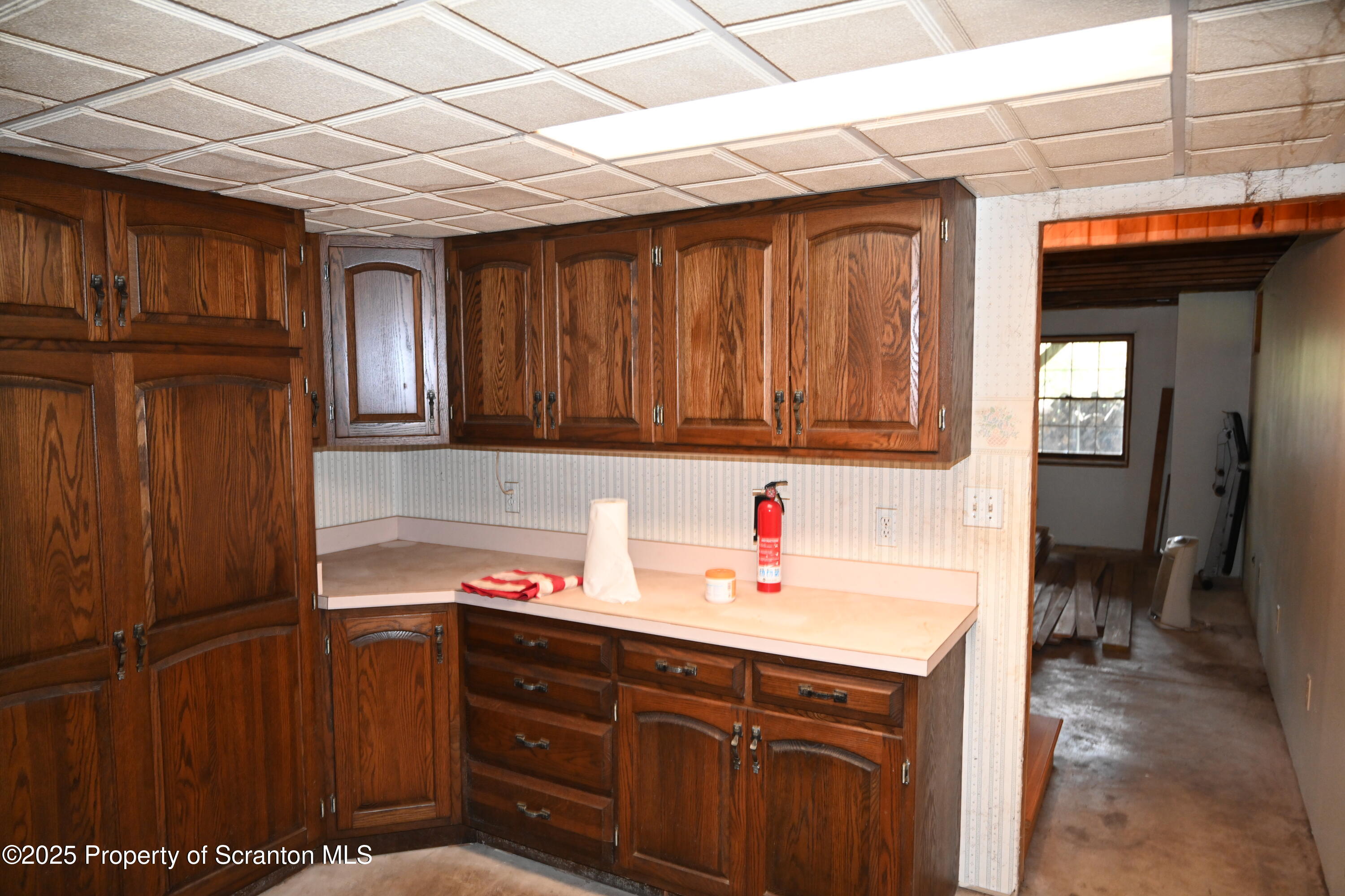 1271 Graham Holw Road Hallstead, PA 18822 - Photo 26 of 56 a kitchen with a sink and cabinets