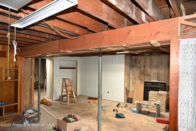 a front view of a building with outdoor seating