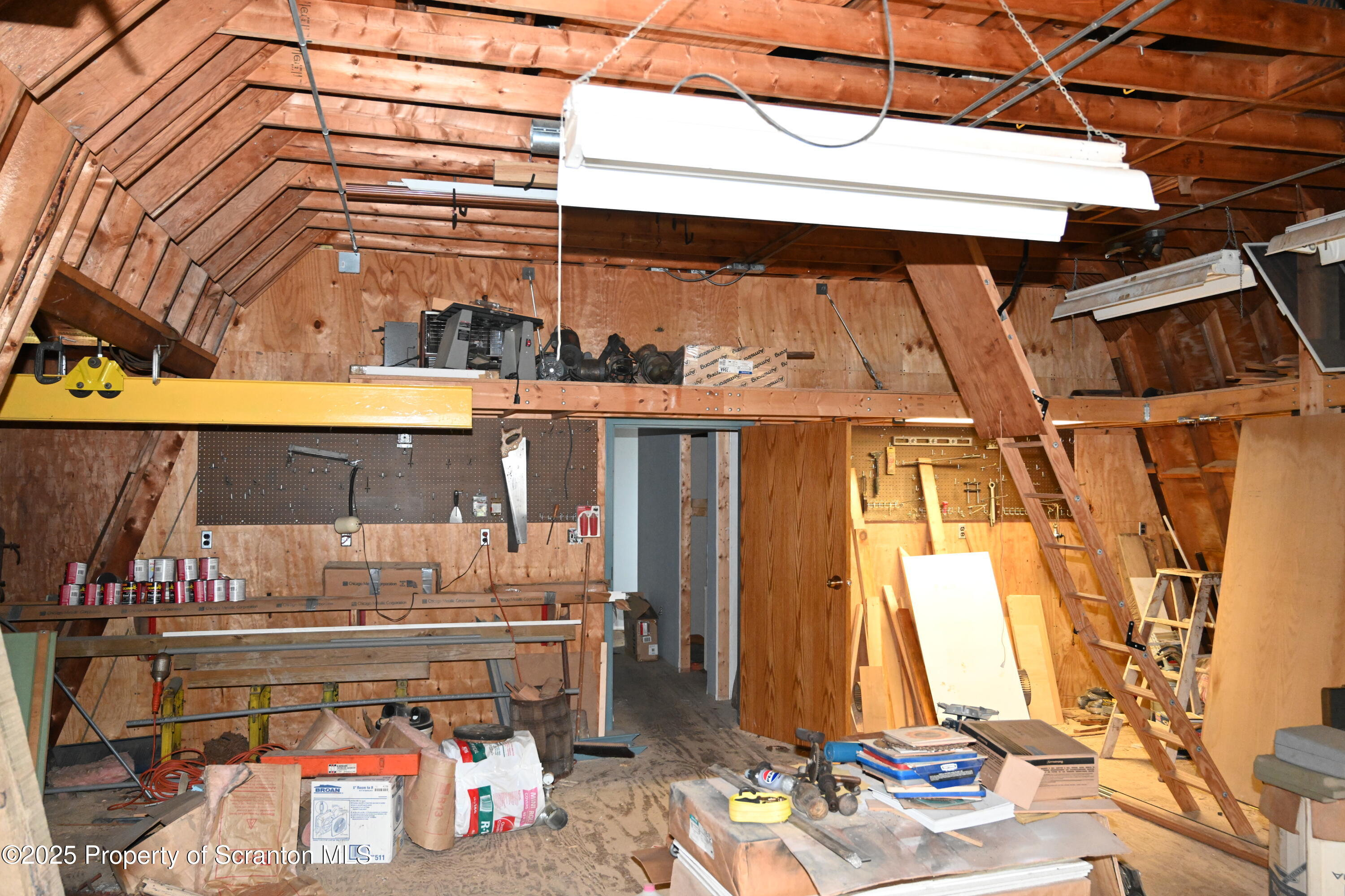 1271 Graham Holw Road Hallstead, PA 18822 - Photo 37 of 56 a room with lots of different colored cloths