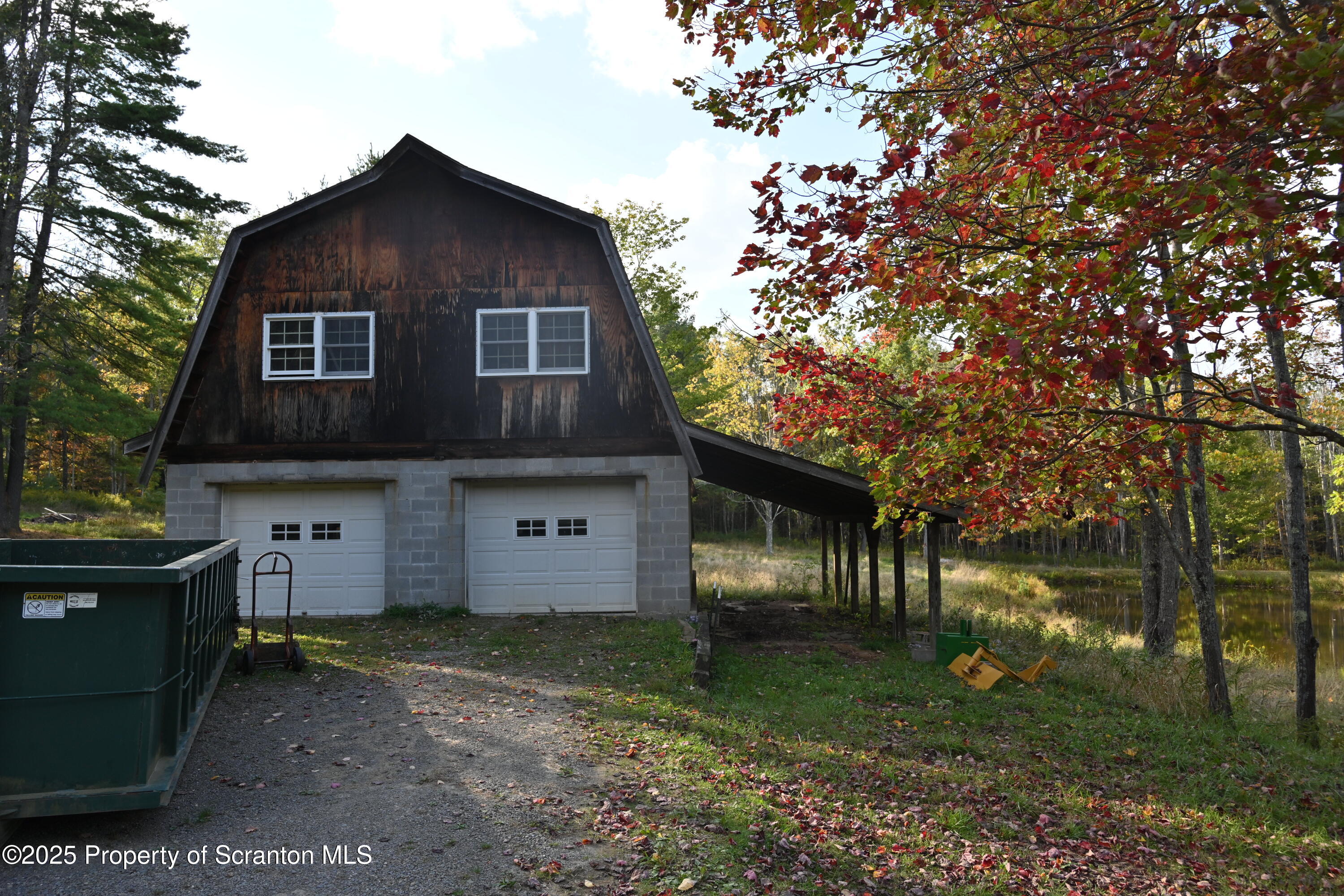 1271 Graham Holw Road Hallstead, PA 18822 - Photo 45 of 56 a front view of a house with garden