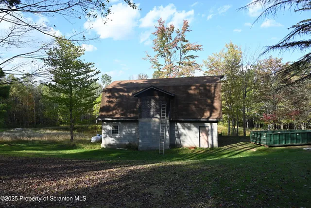 a view of a wooden balcony with a bench