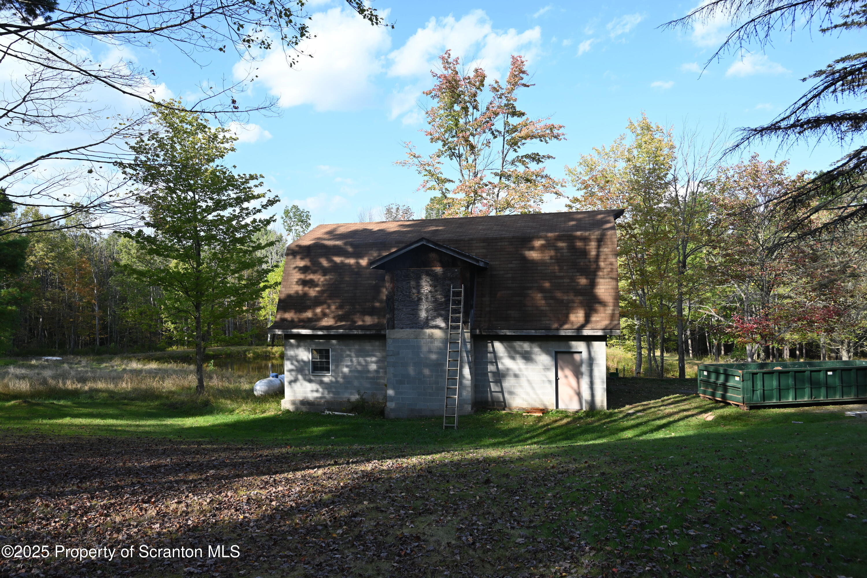 1271 Graham Holw Road Hallstead, PA 18822 - Photo 46 of 56 a front view of a house with garden