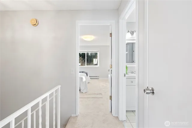 a bathroom with a granite countertop sink
