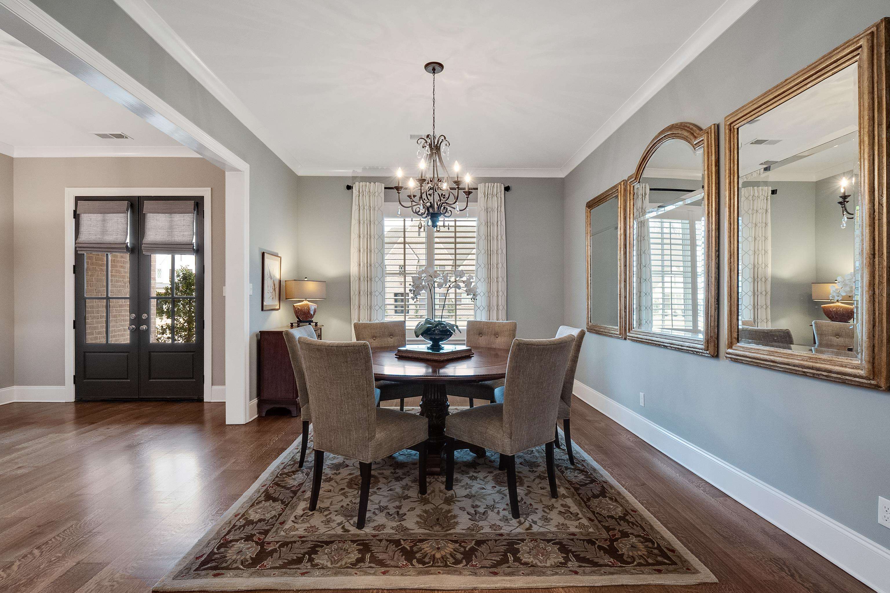 47 Addiegreen Cove Collierville, TN 38017 - Photo 2 of 34 a view of a dining room with furniture window and wooden floor