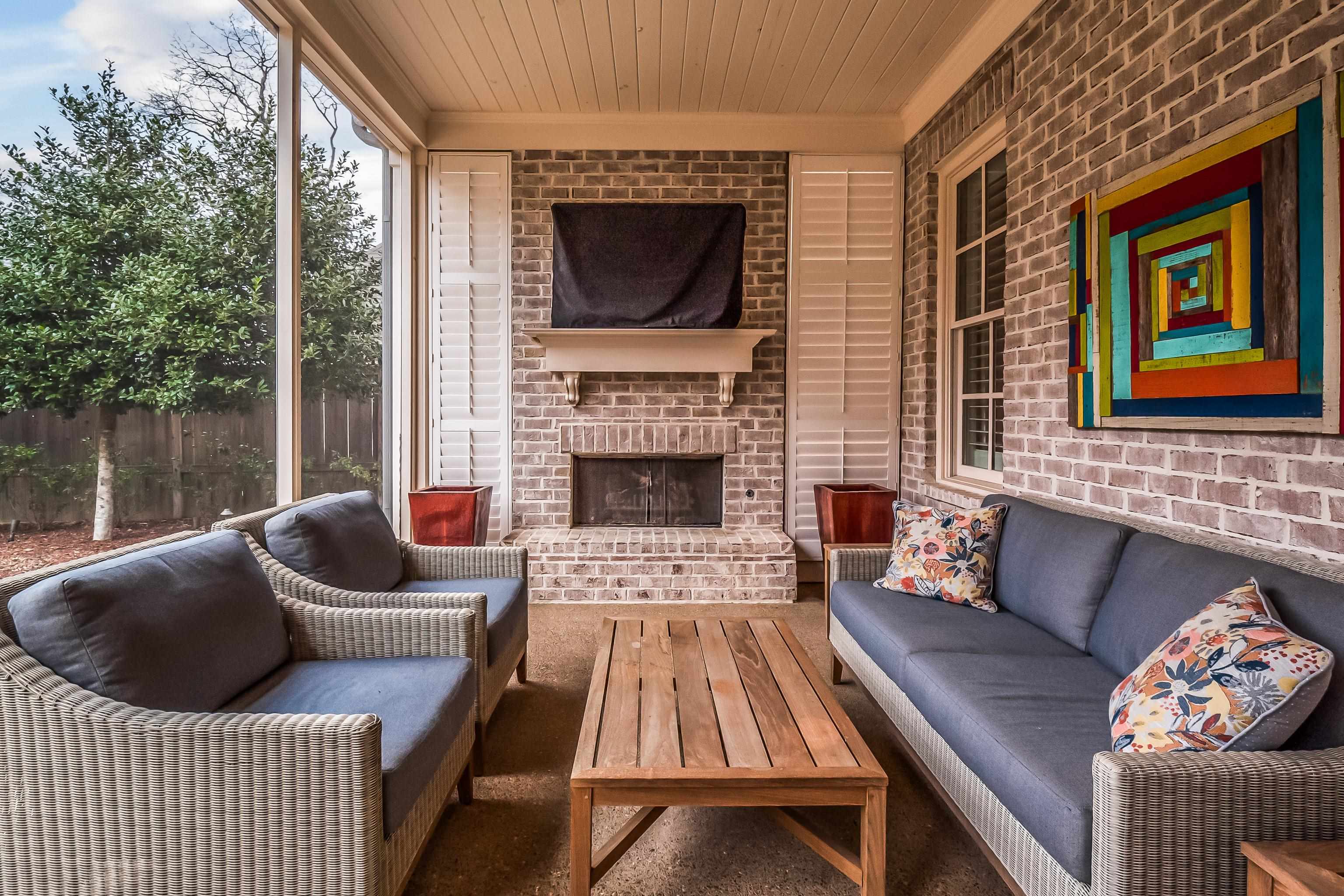 47 Addiegreen Cove Collierville, TN 38017 - Photo 29 of 34 a outdoor living space with furniture and a fireplace