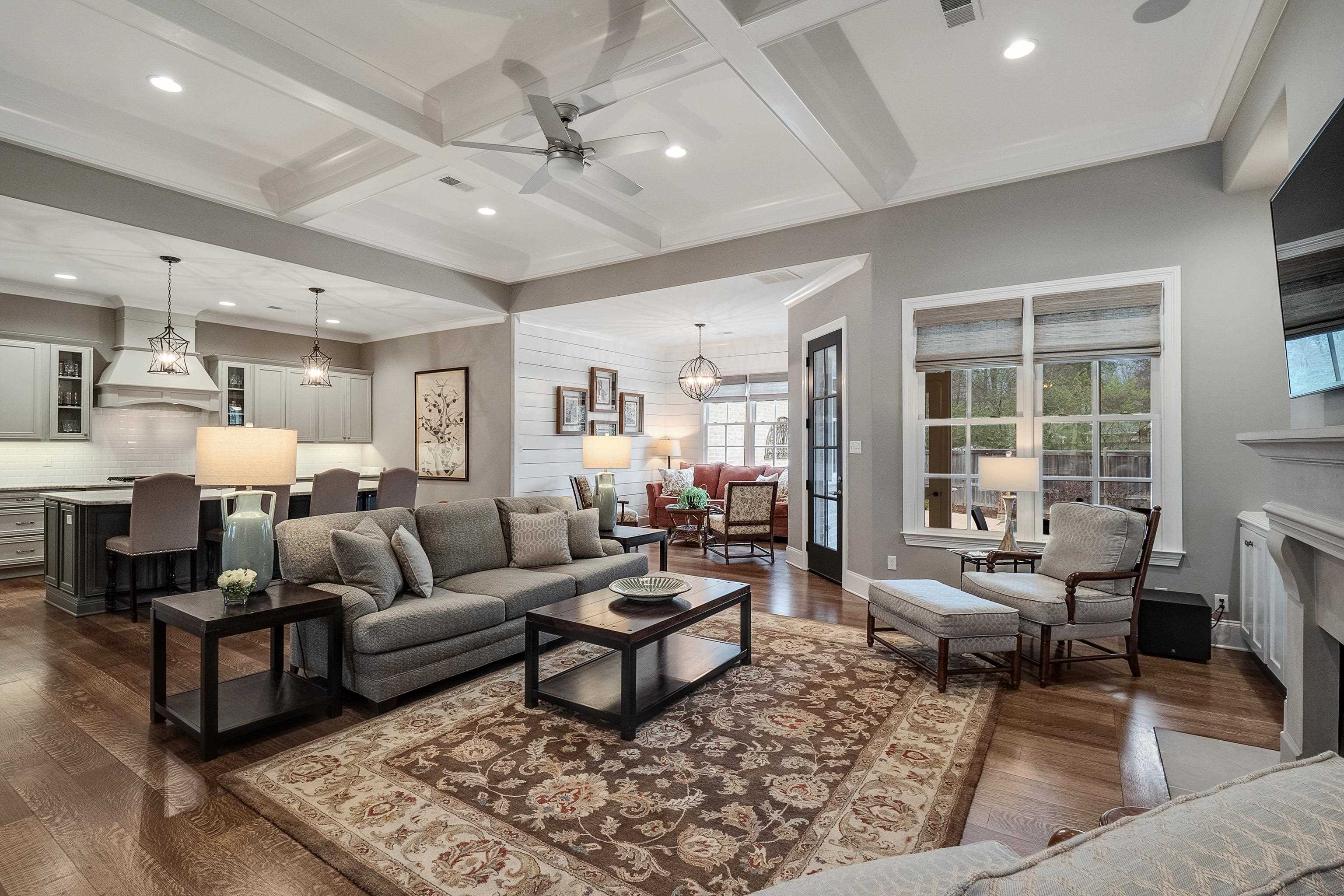 47 Addiegreen Cove Collierville, TN 38017 - Photo 6 of 34 a living room with furniture wooden floor and a table