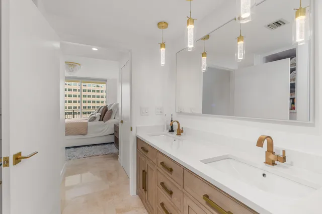 a bathroom with a shower and a sink