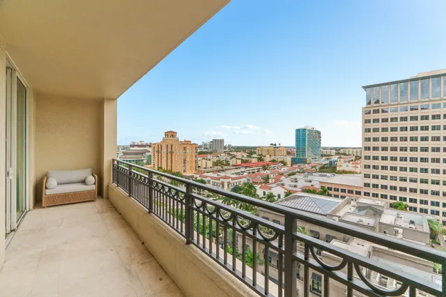a view of a hallway view with wooden floor and staircase