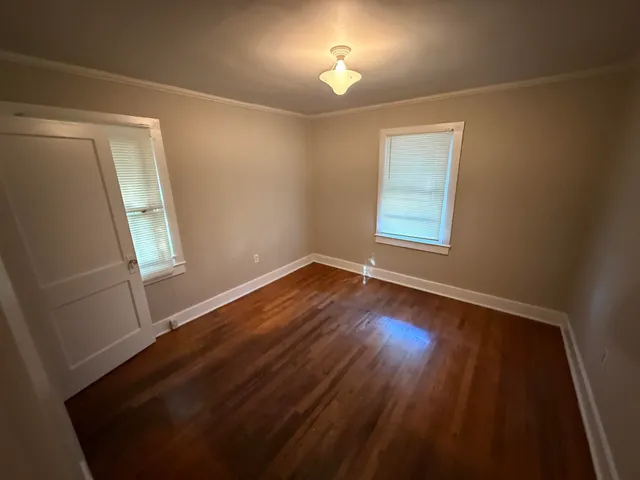 a view of a hallway view with staircase