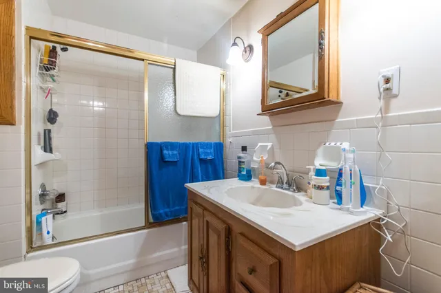 a bathroom with a sink a vanity and a mirror