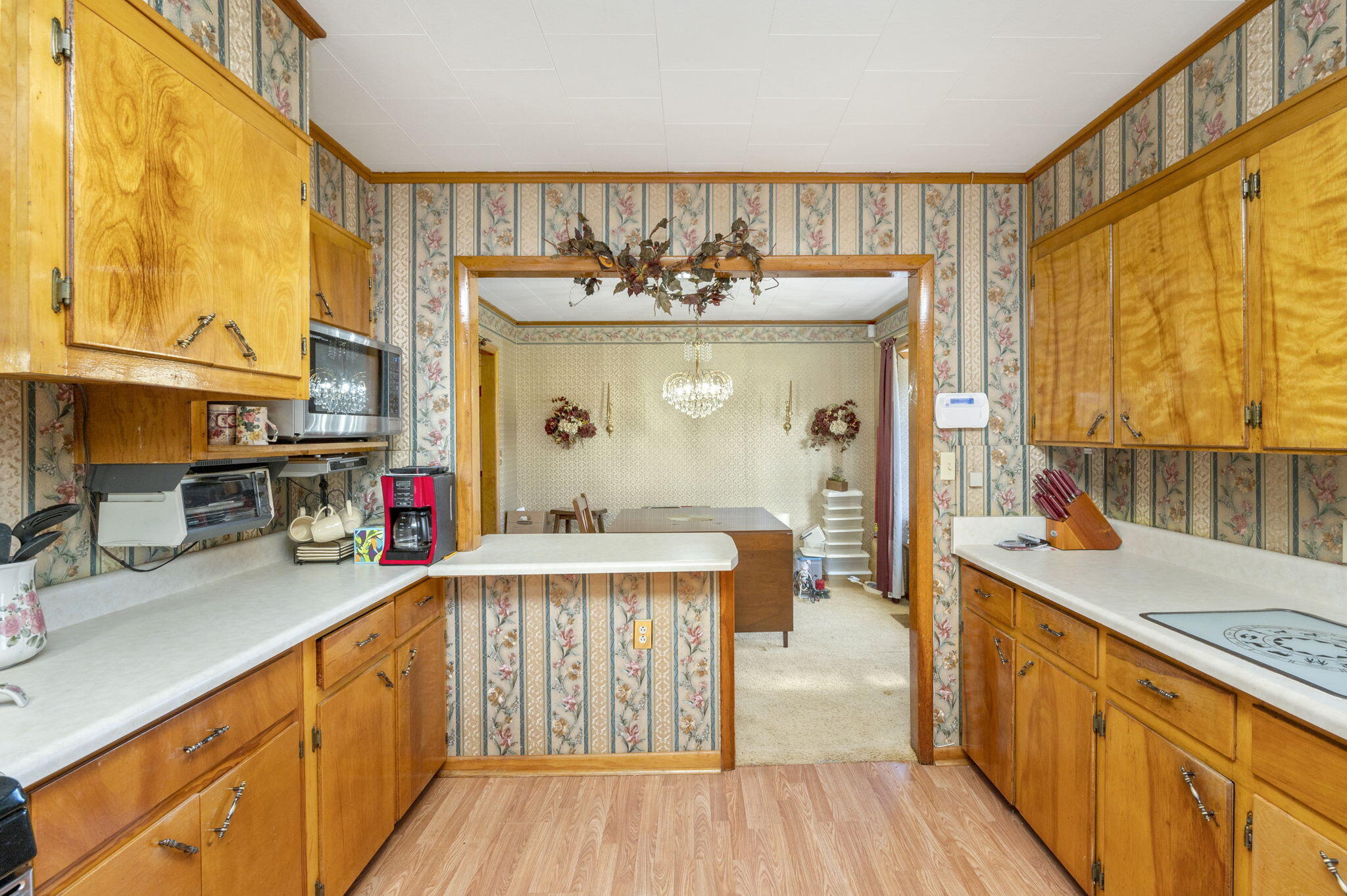 5303 Griffith Mill Road Baker, FL 32531 - Photo 11 of 58 a kitchen with stainless steel appliances a sink and cabinets