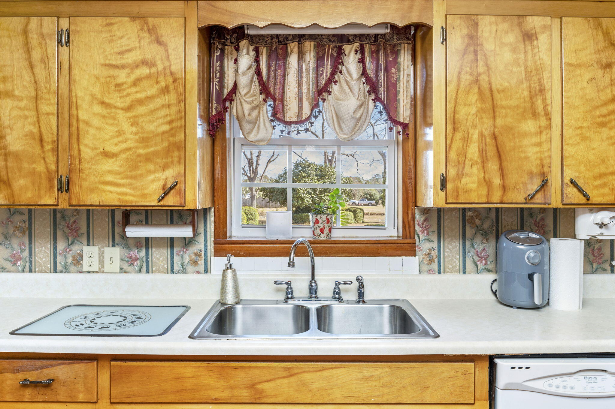 5303 Griffith Mill Road Baker, FL 32531 - Photo 14 of 58 a view of a kitchen with a sink and a window