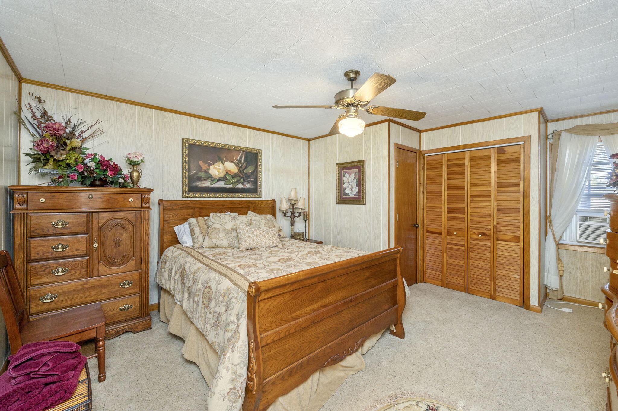 5303 Griffith Mill Road Baker, FL 32531 - Photo 18 of 58 a bedroom with a bed and a window